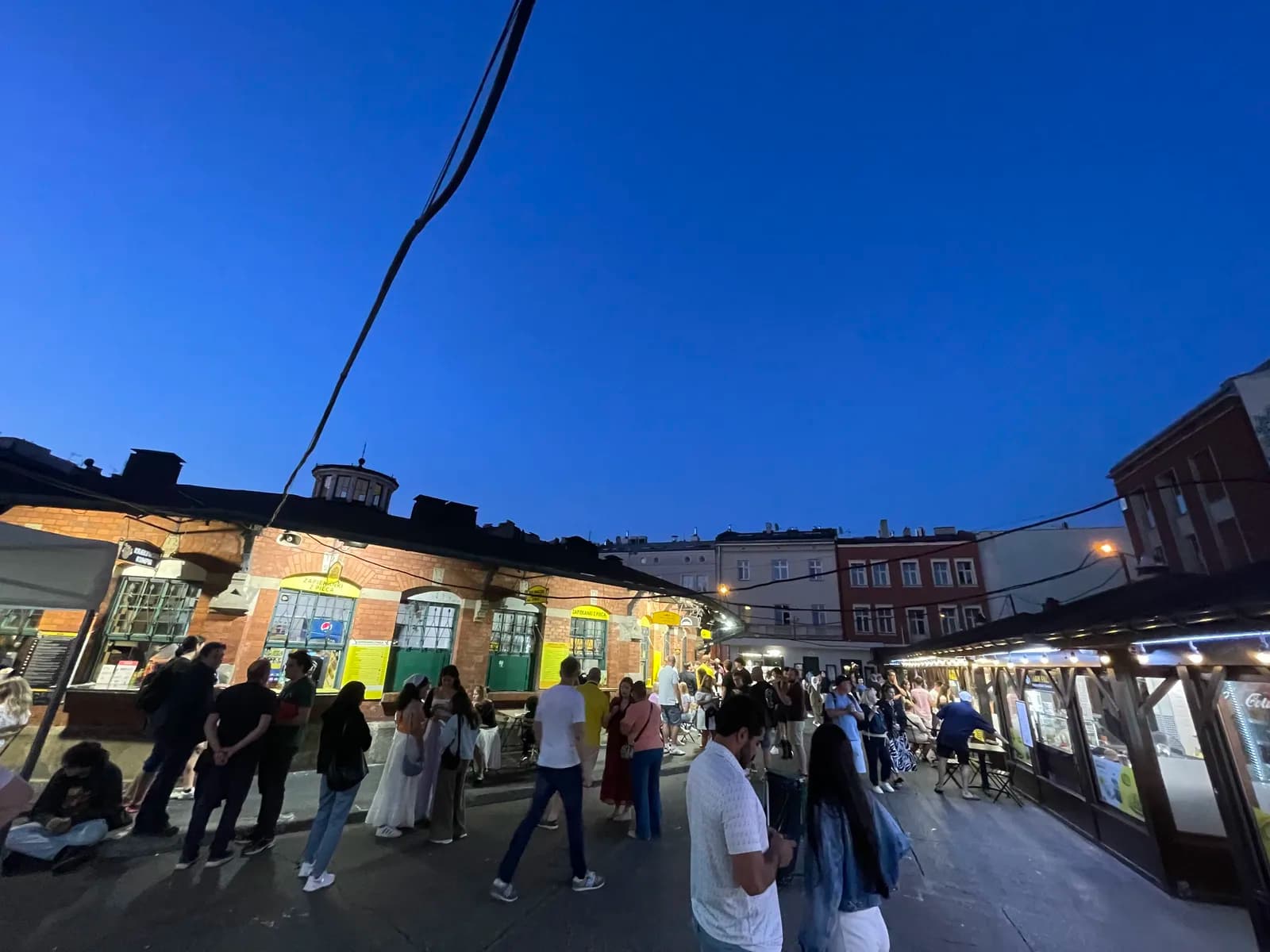 Plac Nowy in the evening, with the Okrąglak's counters, Kazimierz, Kraków